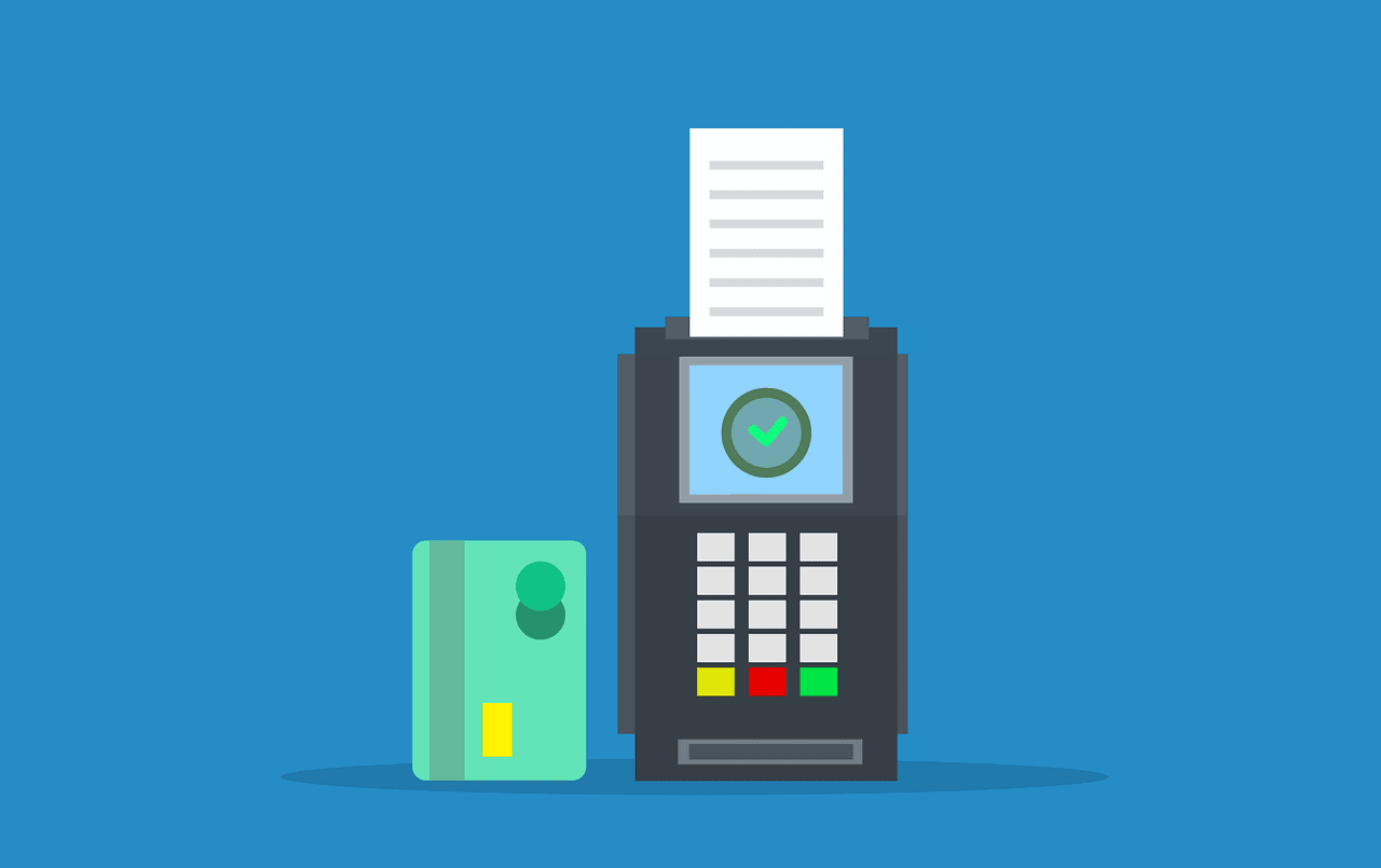 Imagem mostra uma maquininha de pagamento por cartão.